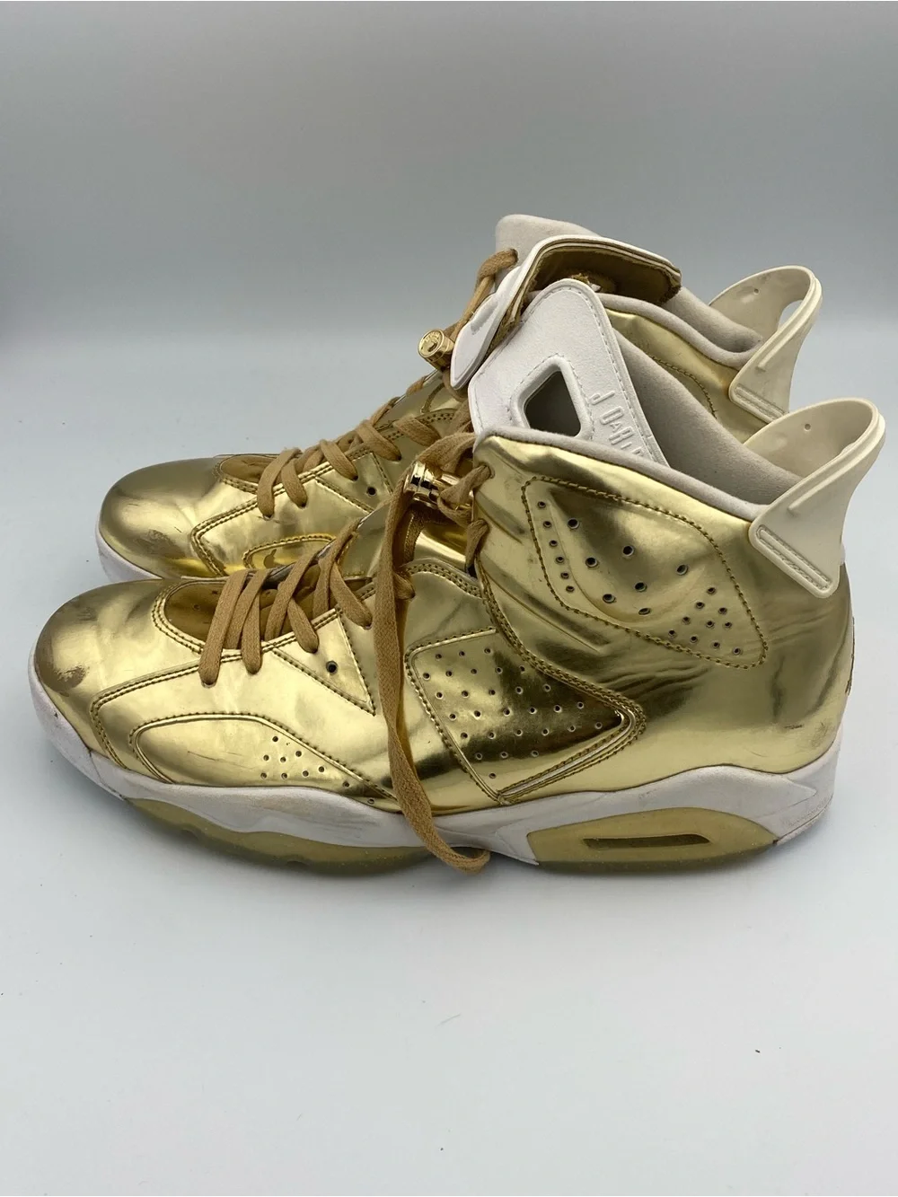 Jordan Metallic Gold High Top Sneakers with White Interior